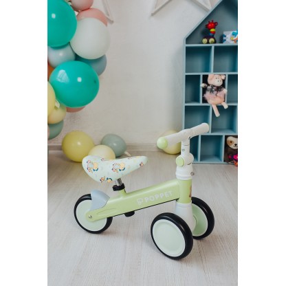 Дитячий триколісний біговел Poppet "Динозавр Спайкі Скейтс", світло-оливковий